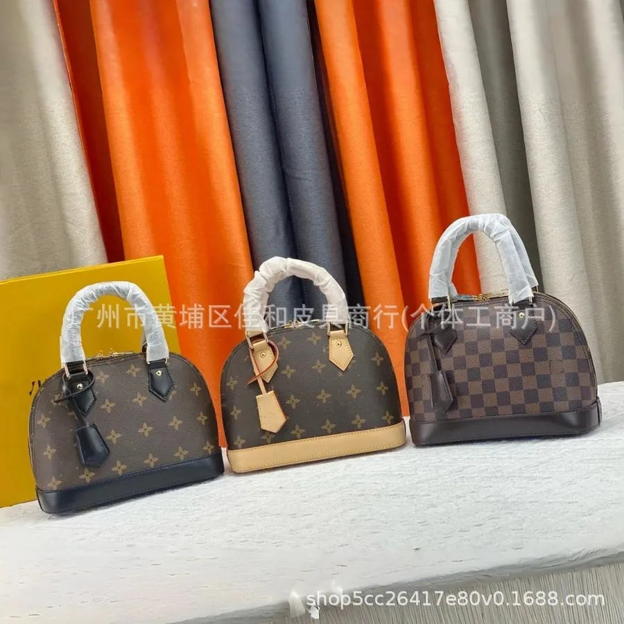 Louis Vuitton Alma Brown Monogram Handbag