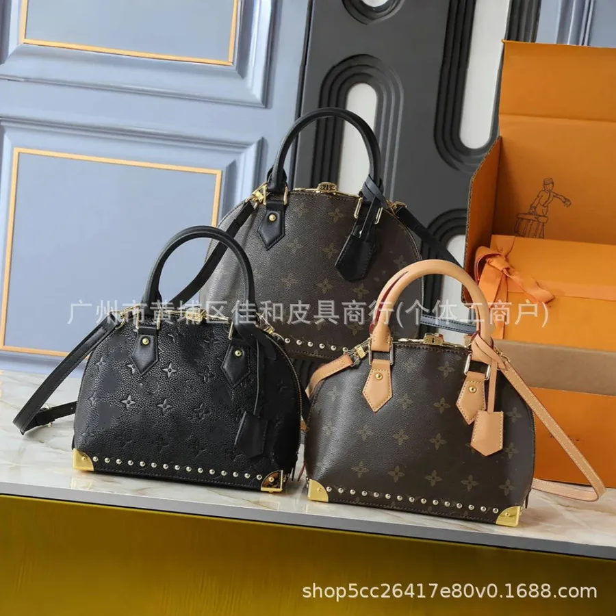 Louis Vuitton Alma Black Monogram Tote Bag